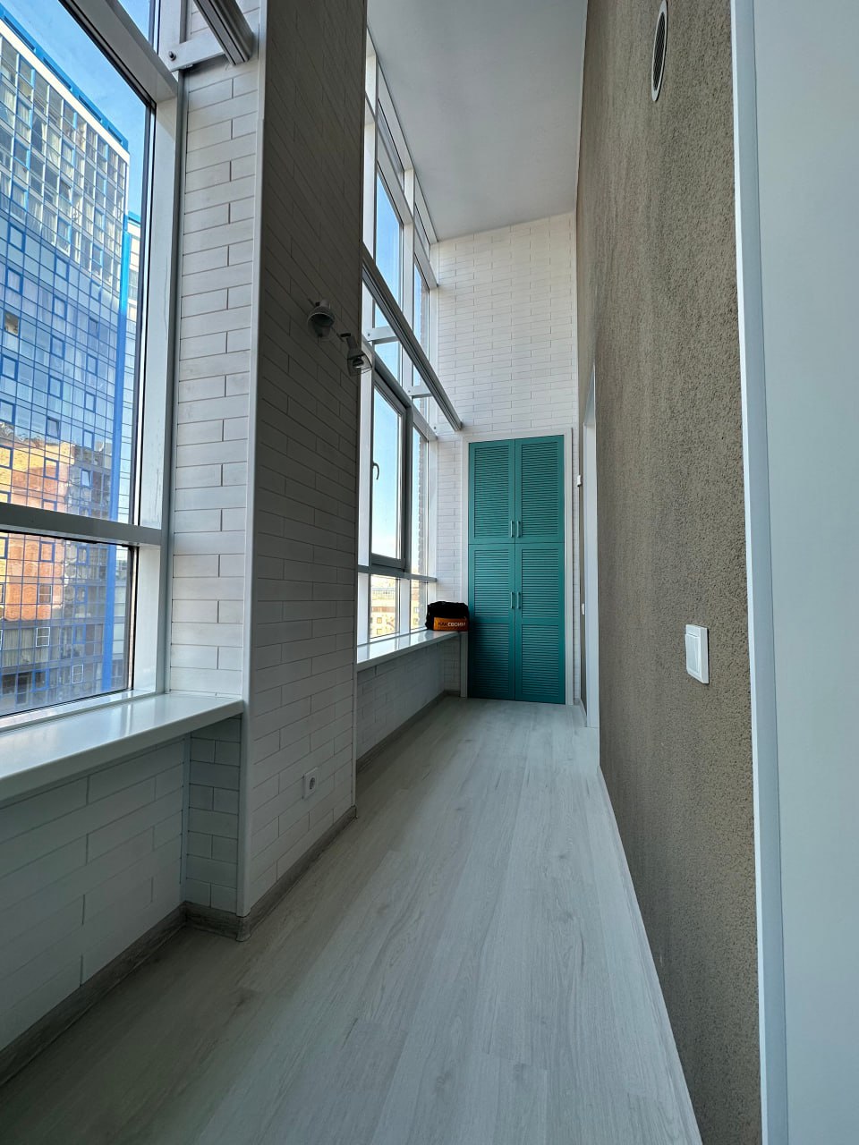 Panoramic Loggia: Renovation with Wide Windows