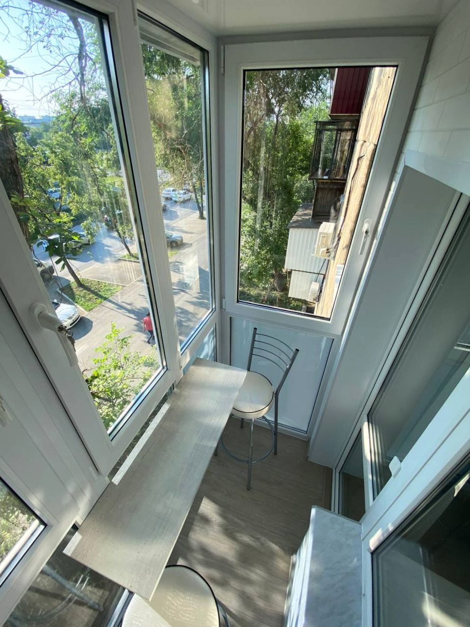 Nature’s Gift: Balcony Upgrade with a Panoramic Window
