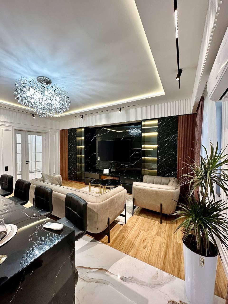 Spacious Living Room Wrapped in Warm Natural Tones